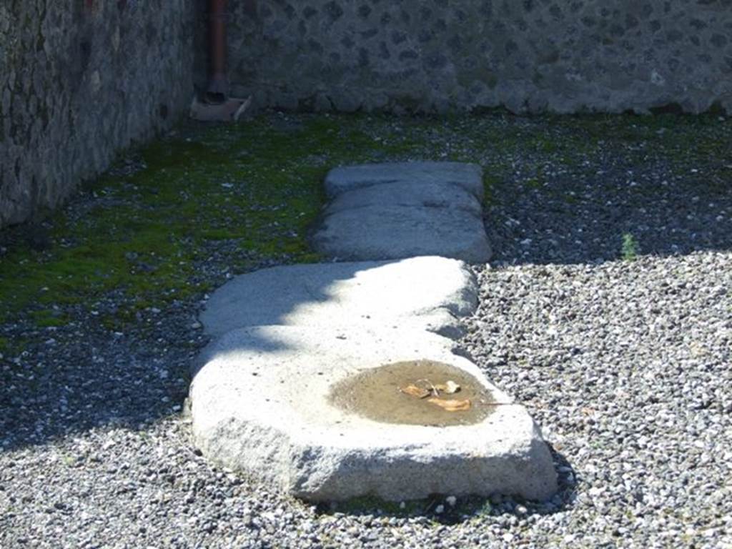 VII.5.26 Pompeii.  March 2009. Four large lava flat bases joined together.