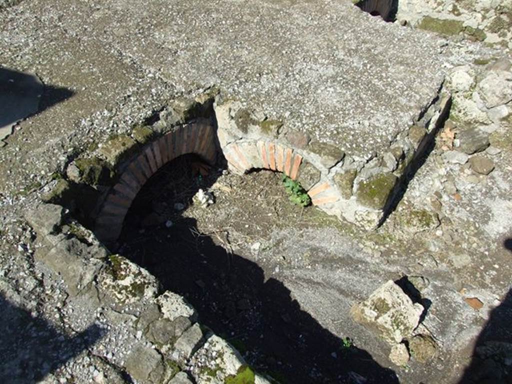 VII.6.1 Pompeii. March 2009.  Road drains on south side at the end of the Via delle Terme, where it joins Vicolo del Farmacista. 