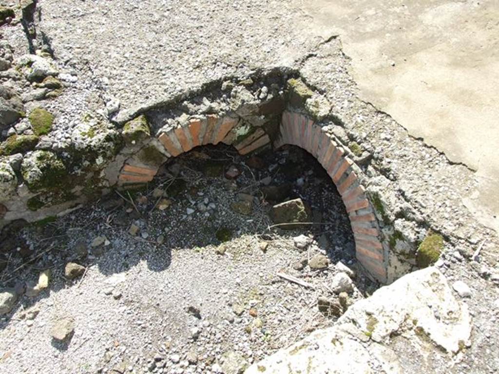 VII.6.1 Pompeii. March 2009.  Road drains on north side at the end of the Via delle Terme, where it joins Vicolo del Farmacista. 