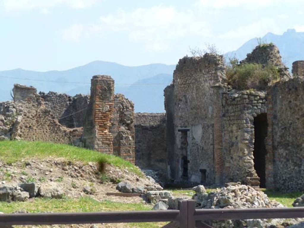 VII.6.3 Pompeii. May 2011. Looking south-west towards rear of VII.6.3, and the rooms on its west side.  Photo courtesy of Michael Binns.
