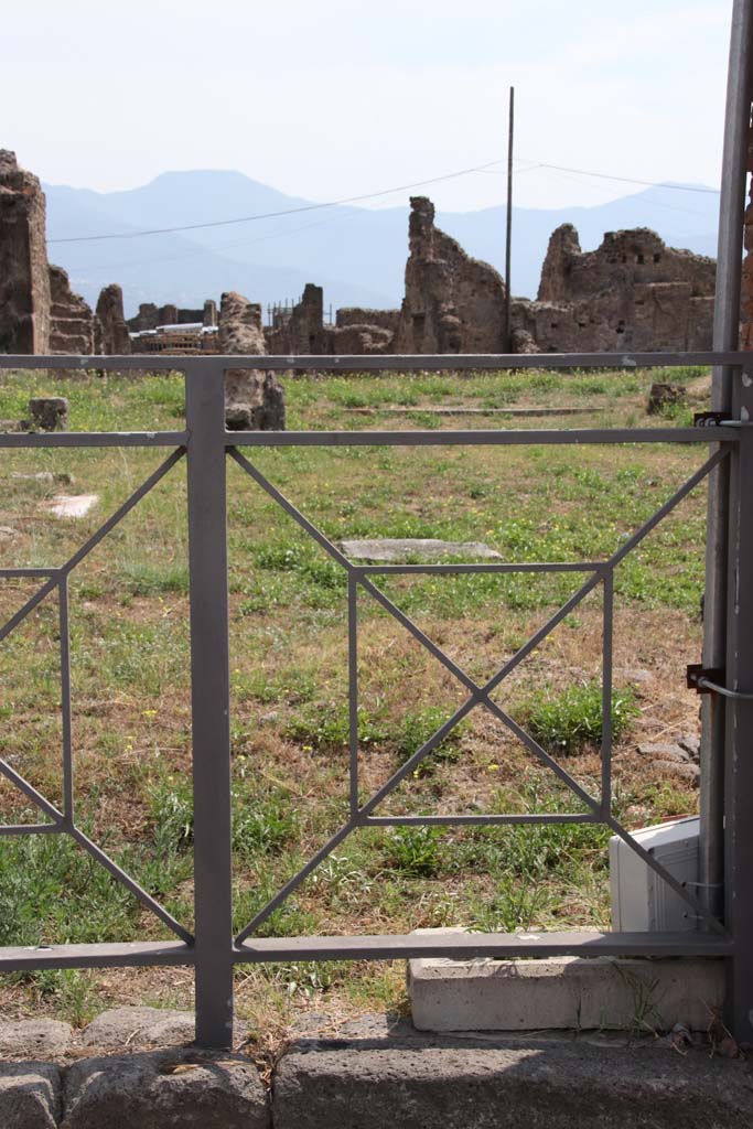 VII.6.7 Pompeii. September 2021. 
Looking south-west towards tablinum, from west side of shop doorway at VII.6.8. Photo courtesy of Klaus Heese.
