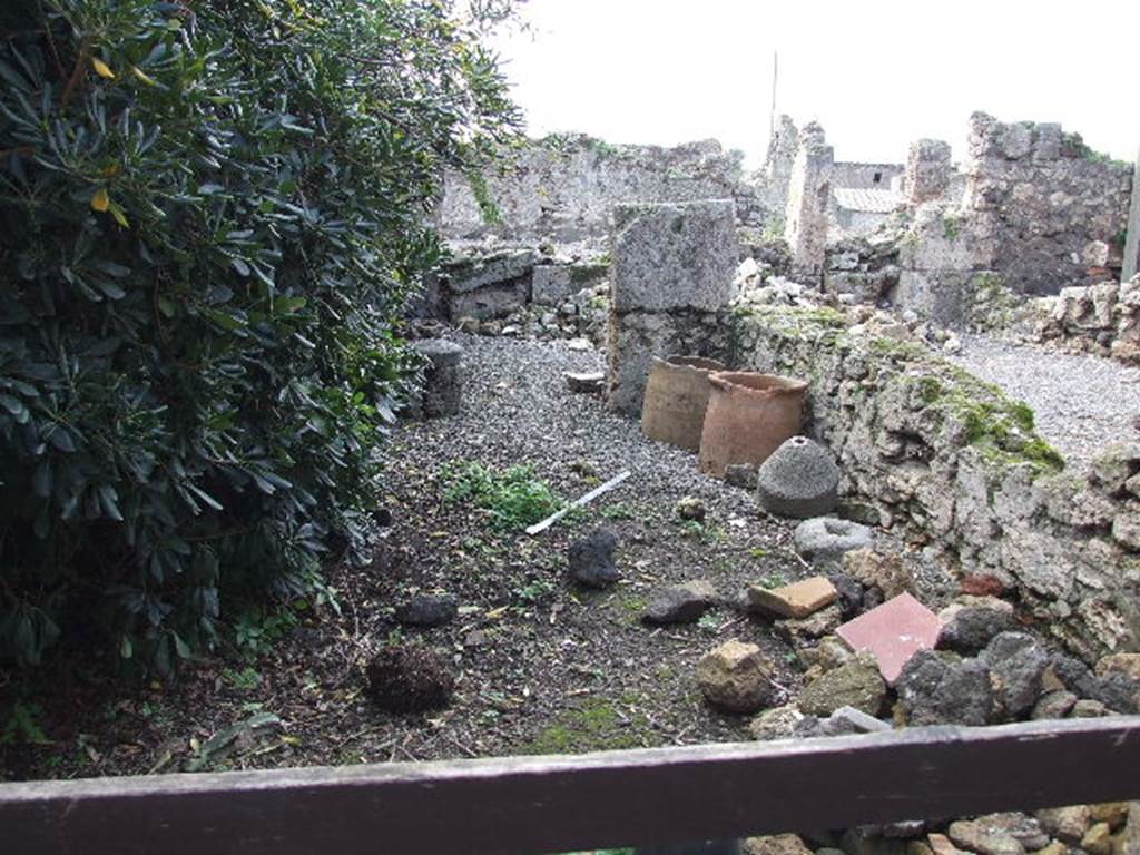 VII.6.21 Pompeii. December 2006. Looking west from entrance, across site of shop.