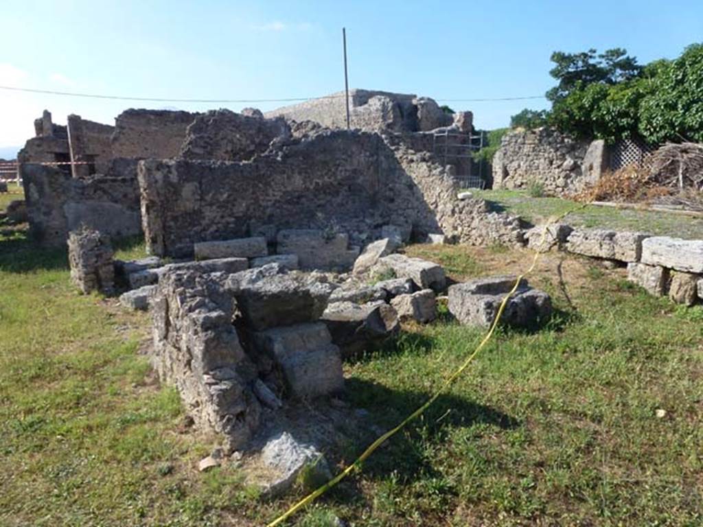 VII.6.28 Pompeii. June 2012. Looking north-east across area of rooms on east side of the atrium.