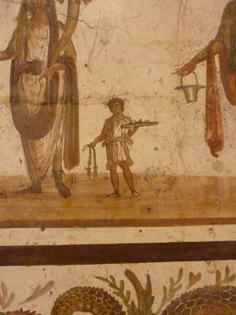 VII.6.38 Pompeii. Detail of priest’s assistant or camillus, shown on lararium painting. Now in Naples Archaeological Museum. Inventory number: 8905.
