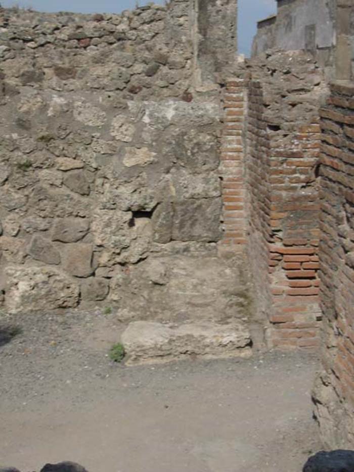 VII.7.9 Pompeii. May 2003. Looking towards the south-east corner of the bar-room. 
Photo courtesy of Nicolas Monteix. According to Eschebach, on the right of the entrance doorway was the hearth.
See Eschebach, L., 1993. Gebäudeverzeichnis und Stadtplan der antiken Stadt Pompeji. Köln: Böhlau.(p.300)
