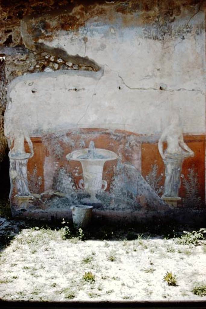 VII.7.13Pompeii. 1961. West wall of peristyle garden of house at VII.7.10.    Photo by Stanley A. Jashemski.
Source: The Wilhelmina and Stanley A. Jashemski archive in the University of Maryland Library, Special Collections (See collection page) and made available under the Creative Commons Attribution-Non Commercial License v.4. See Licence and use details.
J61f0804
