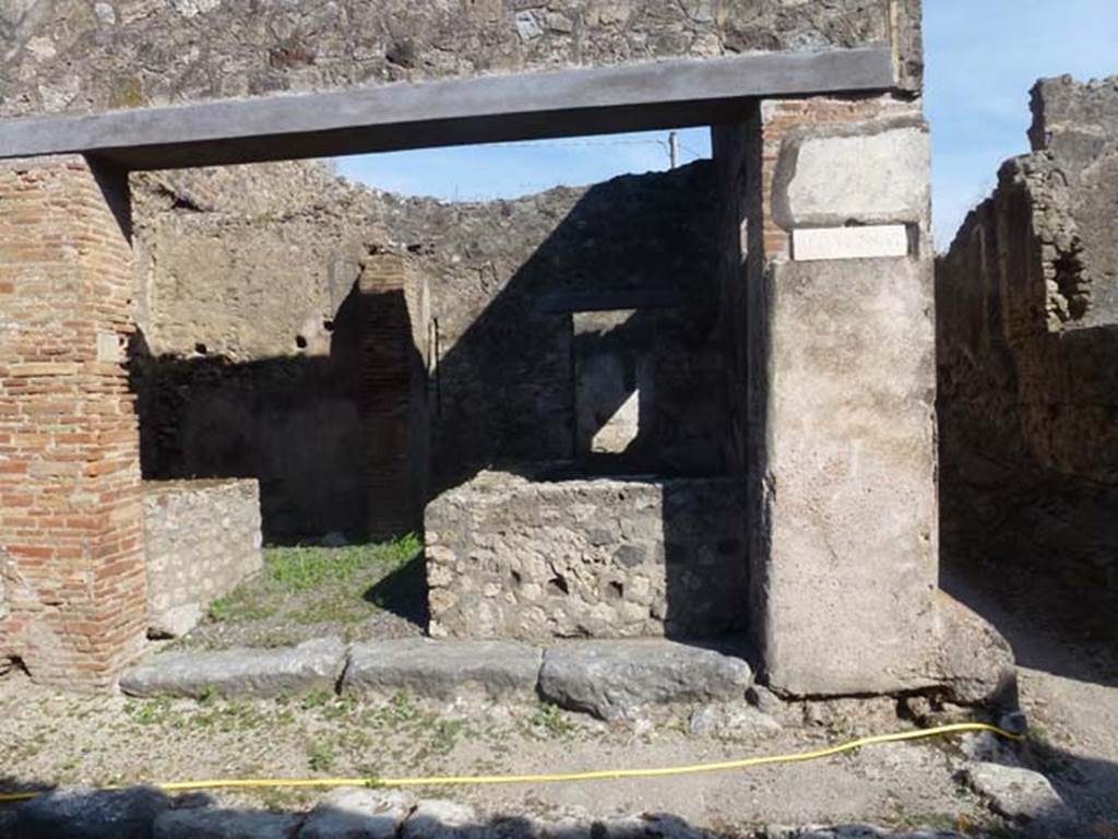 VII.7.18 Pompeii. June 2012. Looking south towards entrance to bar-room.