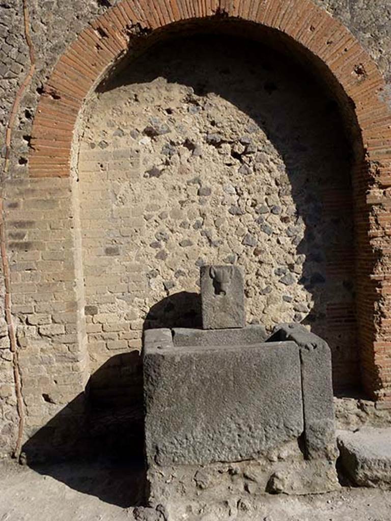 Fountain next to VII.7.26 outside north wall of VII.8, Pompeii. June 2012. Photo courtesy of Michael Binns.
