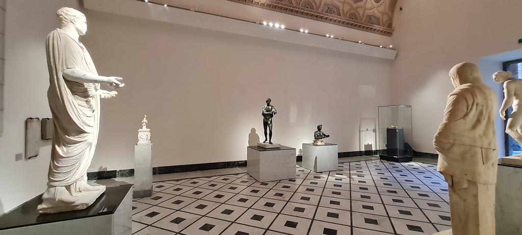 VII.7.32 Pompeii. April 2023. 
Looking across one of the “Campania Romana” galleries in Naples Archaeological Museum with statues from the Temple. 
Photo courtesy of Giuseppe Ciaramella.

