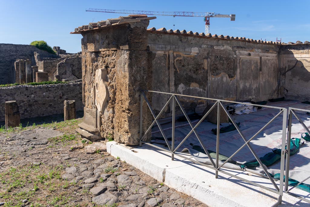 VII.7.32 Pompeii. October 2023. Looking towards west side of entrance doorway to cella. Photo courtesy of Johannes Eber.