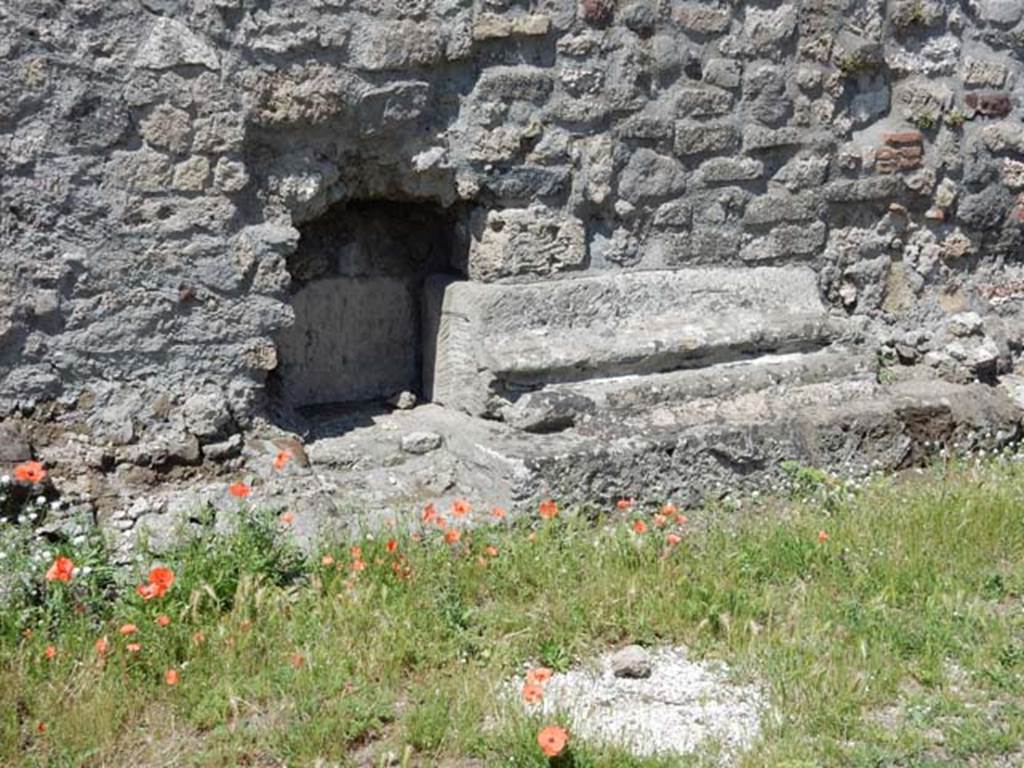 VII.7.32 Pompeii. May 2018. Detail from east side of podium. Photo courtesy of Buzz Ferebee.