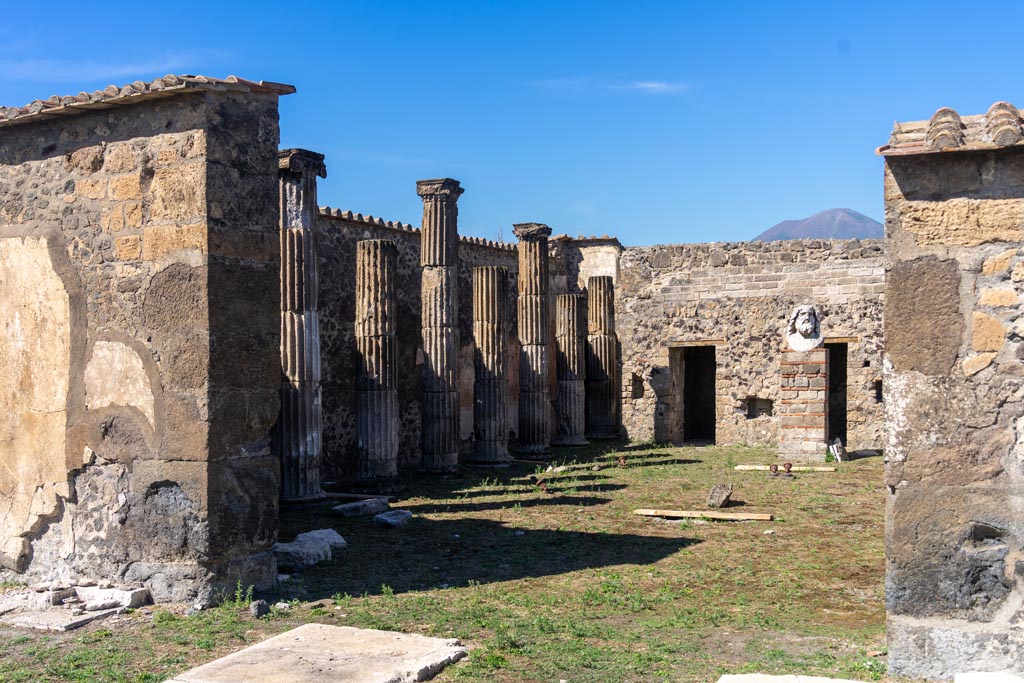 VII.8.1 Pompeii. October 2023. Looking through doorway towards west side of Temple from podium. Photo courtesy of Johannes Eber.