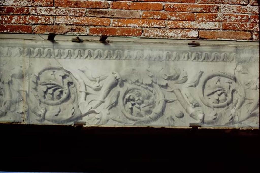 VII.9.1 Pompeii. 1991. Entrance decoration, top right of middle of top of doorway.
Source: The Wilhelmina and Stanley A. Jashemski archive in the University of Maryland Library, Special Collections (See collection page) and made available under the Creative Commons Attribution-Non Commercial License v.4. See Licence and use details. J91f0014
