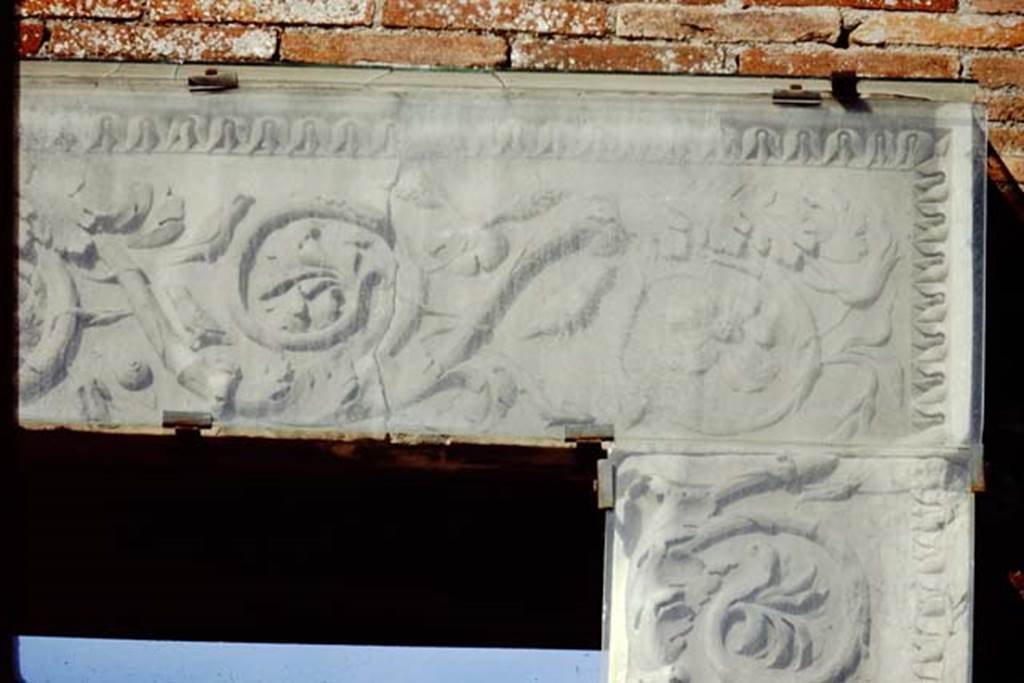 VII.9.1 Pompeii. 1991. Entrance decoration, top of south side of doorway. 
Source: The Wilhelmina and Stanley A. Jashemski archive in the University of Maryland Library, Special Collections (See collection page) and made available under the Creative Commons Attribution-Non Commercial License v.4. See Licence and use details.
J91f0013
