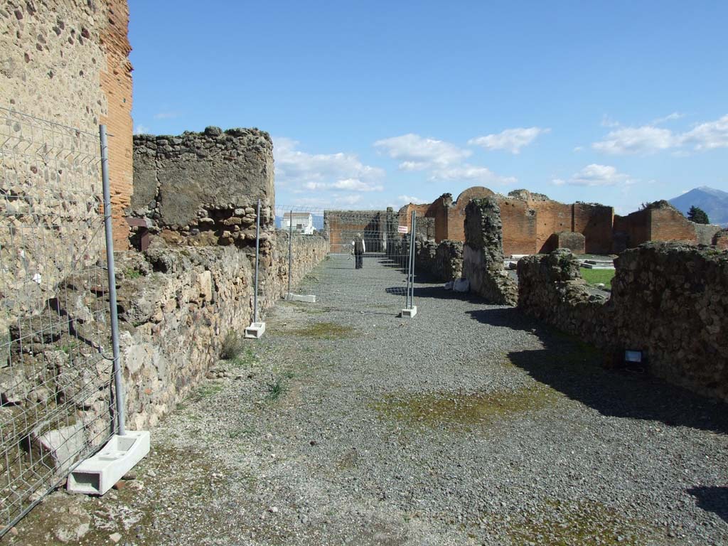 VII.9.1 Pompeii. March 2009. Looking east along outer north corridor 12.