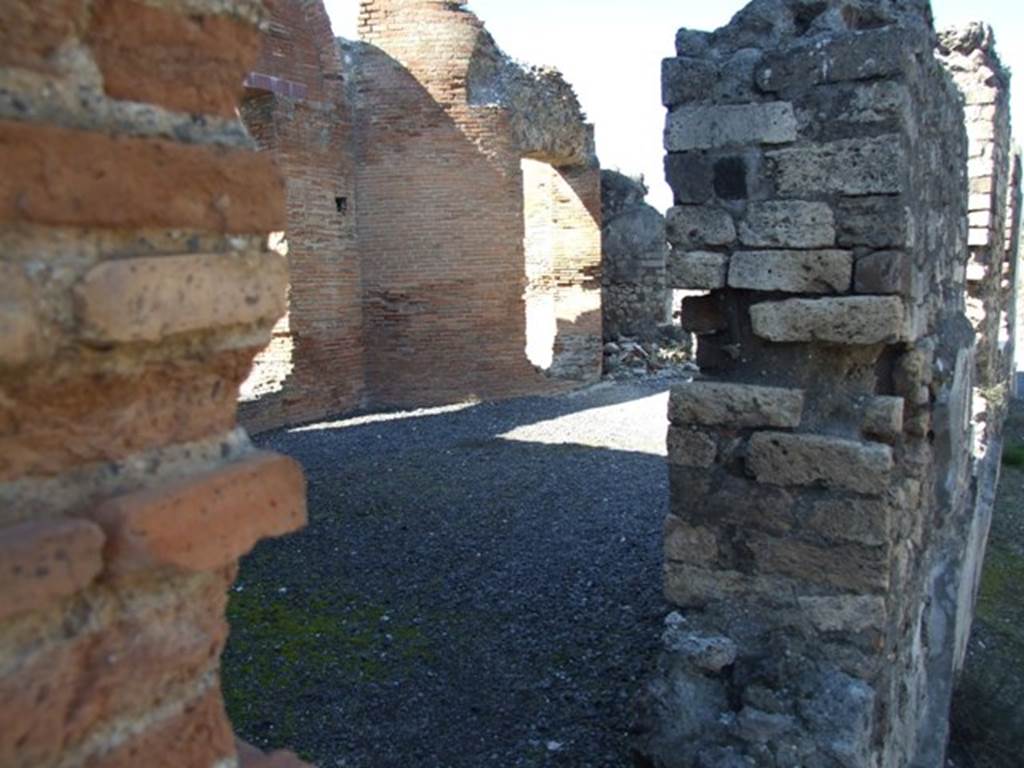 VII.9.1 Pompeii. March 2009. Looking west from east corridor 12 into light court 11.