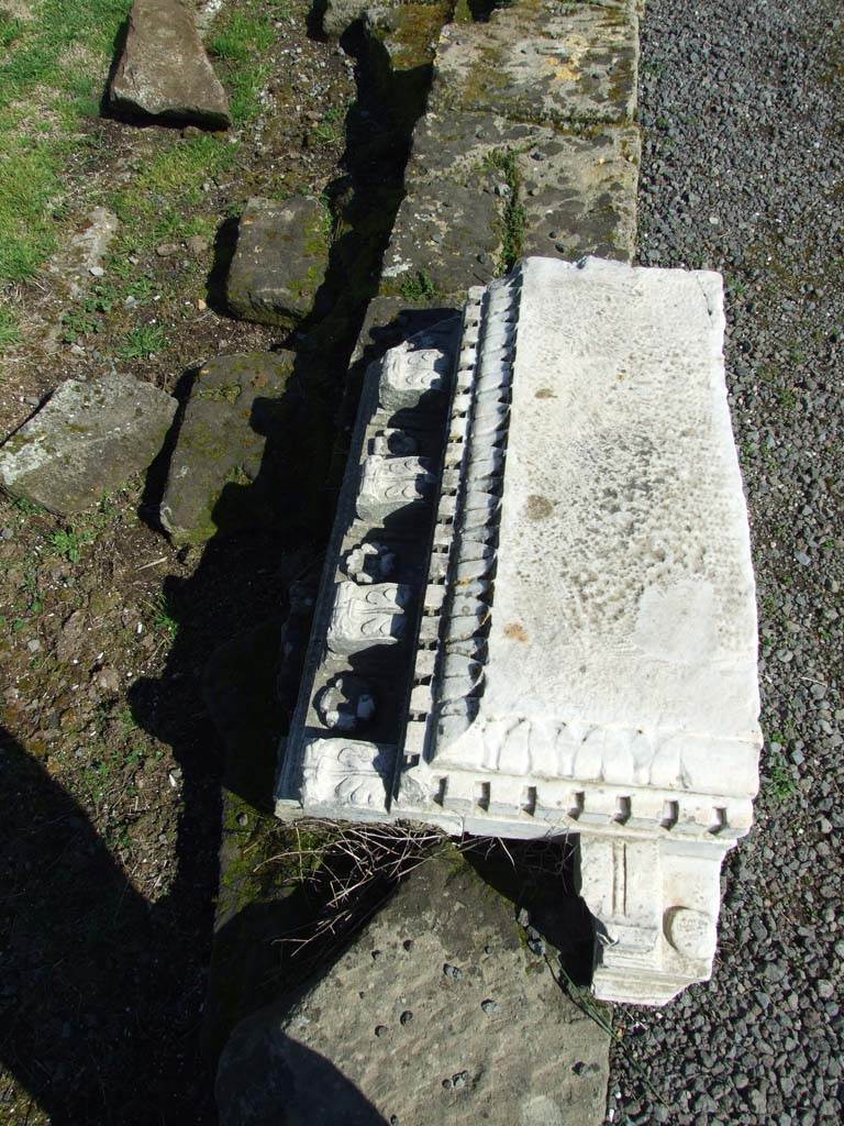 VII.9.1 Pompeii. March 2009. Carved marble on ground.