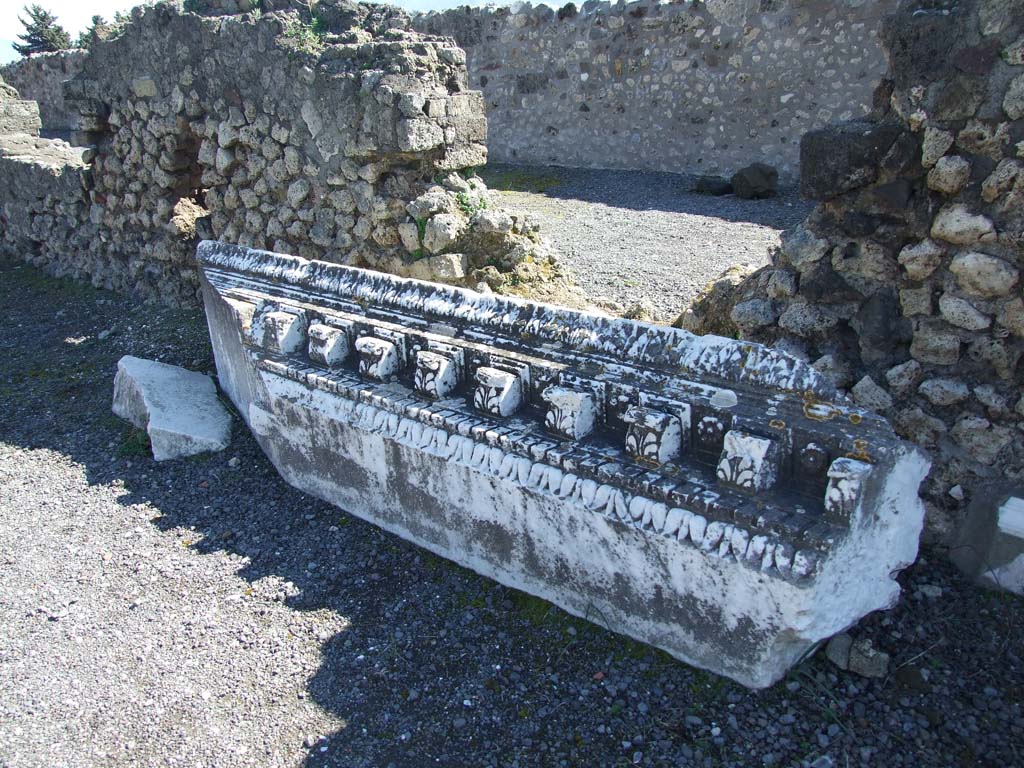 VII.9.1 Pompeii. March 2009. Carved marble on ground.