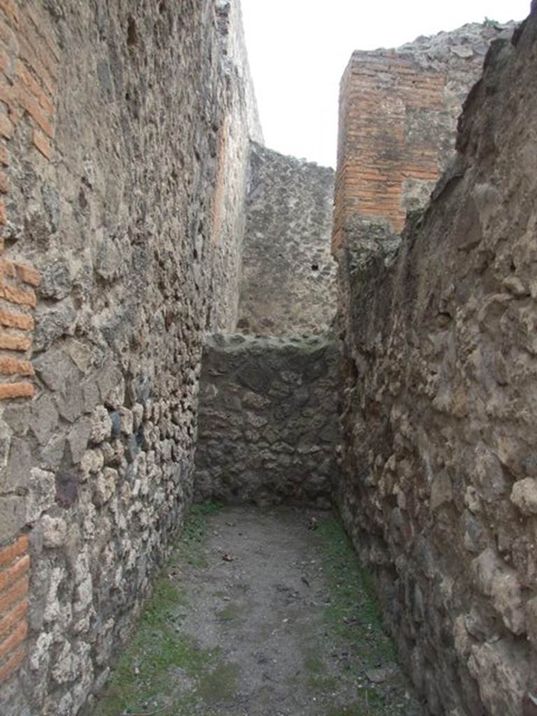 VII.9.13 Pompeii. December 2007. Site of steps to upper floor.  
Della Corte surmised that these steps led to the rooms of the society of makers and sellers of unguents and perfumes. Found on the wall at the side of the stairs was CIL IV 609 in support of the candidate Verus  
Unguentari facite rog(amus)  Another electoral recommendation that he could read, he published for the first time 
Modestum Aed
(Unguen)tari et Pauper(es) facite
See Della Corte, M., 1965.  Case ed Abitanti di Pompei. Napoli: Fausto Fiorentino. (p.181)
According to Epigraphik-Datenbank Clauss/Slaby (See www.manfredclauss.de) these read 
[CIL IV 609]
