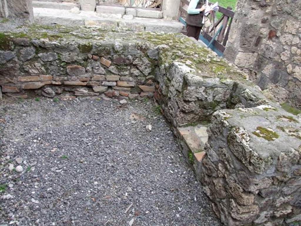 VII.9.22 Pompeii. December 2007. Looking north from rear of counter, with hearth on the east side, on the right.