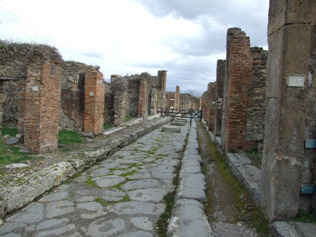 VII.4 Pompeii. December 2007.  Via degli Augustali looking east.    VII.9.23 on right.  