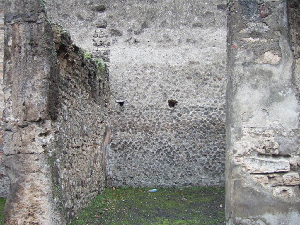 VII.9.25 Pompeii. December 2005. Looking towards south-east corner of shop. 