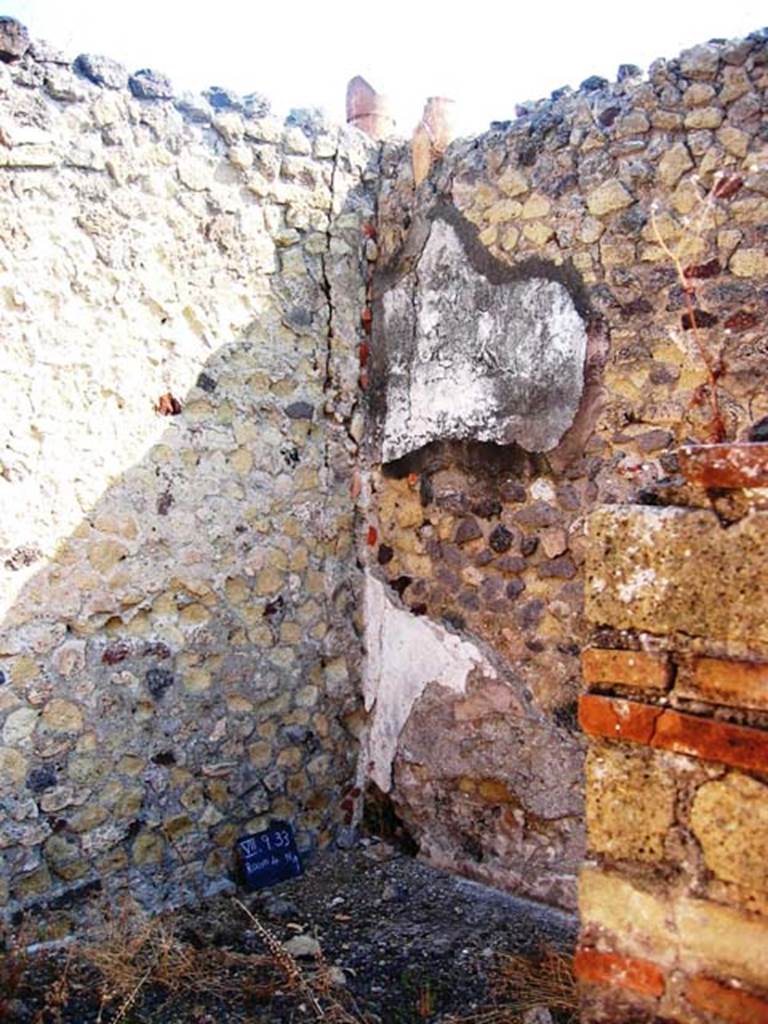 VII.9.33 Pompeii. July 2008. Downpipes in north-east corner of first room on right. Photo courtesy of Barry Hobson.