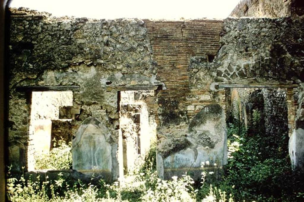 VII.9.40/27 Pompeii. 1959. Looking south across garden area, through a central doorway to corridor leading to atrium.
On either side of the doorway is a window, on the left overlooking the garden from a cubiculum, on the right from the triclinium. Photo by Stanley A. Jashemski.
Source: The Wilhelmina and Stanley A. Jashemski archive in the University of Maryland Library, Special Collections (See collection page) and made available under the Creative Commons Attribution-Non Commercial License v.4. See Licence and use details.
J59f0387


