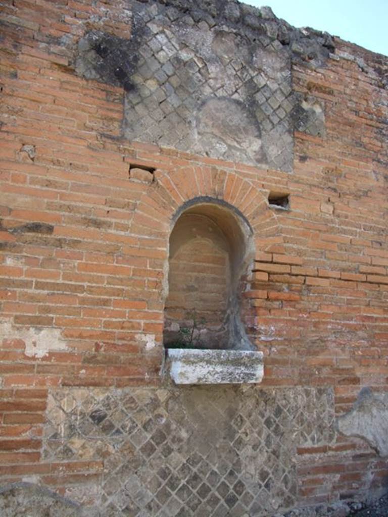 VII.9.42 Pompeii. March 2009. West wall. Arched niche of Street altar.