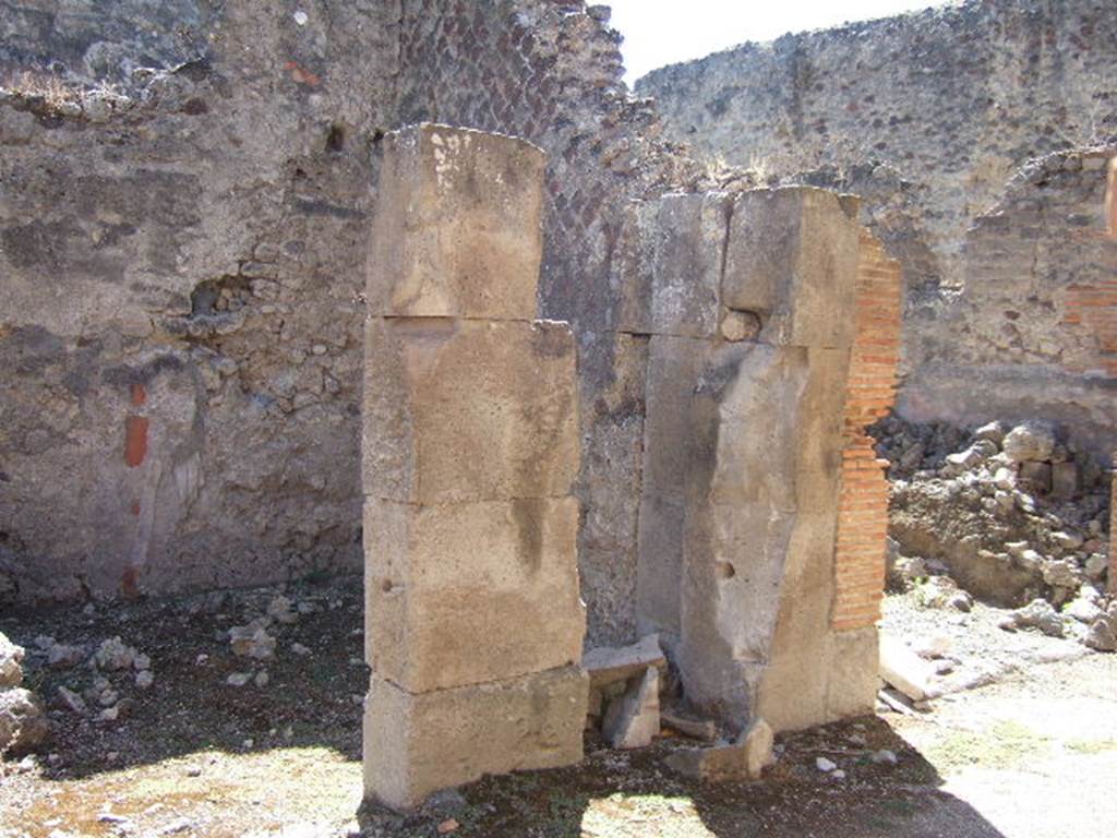 VII.9.45 Pompeii. September 2005. Looking south-west at entrance doorway of separate steps to upper floor.