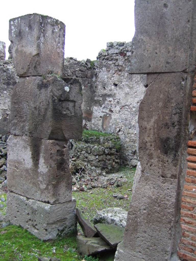 VII.9.45 Pompeii. December 2005. Looking south-east through doorway of separate steps to upper floor.