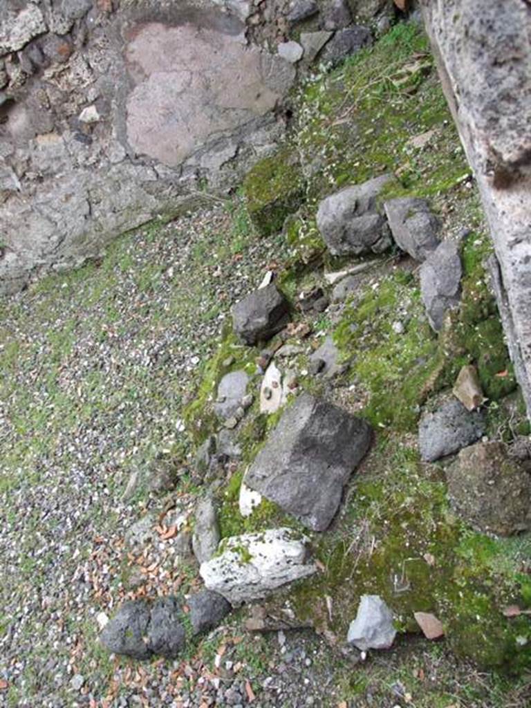 VII.9.48 Pompeii.  March 2009.  Remains of staircase and hearth in south east corner.