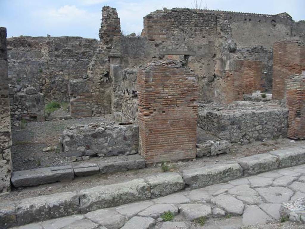 VII.9.56 and VII.9.55, Pompeii. May 2003. Looking west on Vicolo di Eumachia. VII.9.55 is on the right. Photo courtesy of Nicolas Monteix.