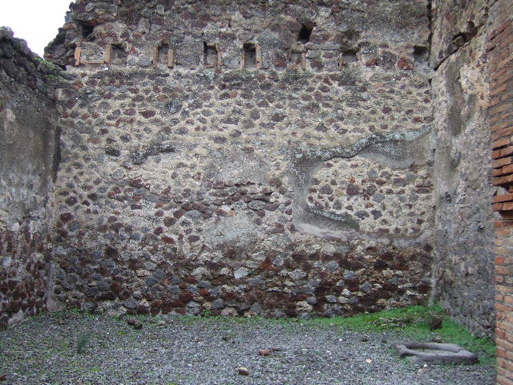 VII.9.59 Pompeii. December 2005. Looking west across shop. According to Eschebach, on the left would have been the counter, but no longer visible.
On the right would have been the steps to the upper floor with a latrine beneath them. The cistern-mouth can also be seen on the right. 
See Eschebach, L., 1993. Gebudeverzeichnis und Stadtplan der antiken Stadt Pompeji. Kln: Bhlau. (p.318)
