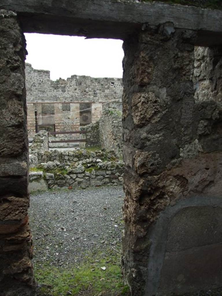 VII.10.12 Pompeii.  March 2009. Looking east from corridor into room on north side of atrium.