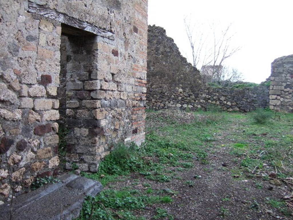 VII.11.1 Pompeii. December 2005. Looking east from entrance doorway.