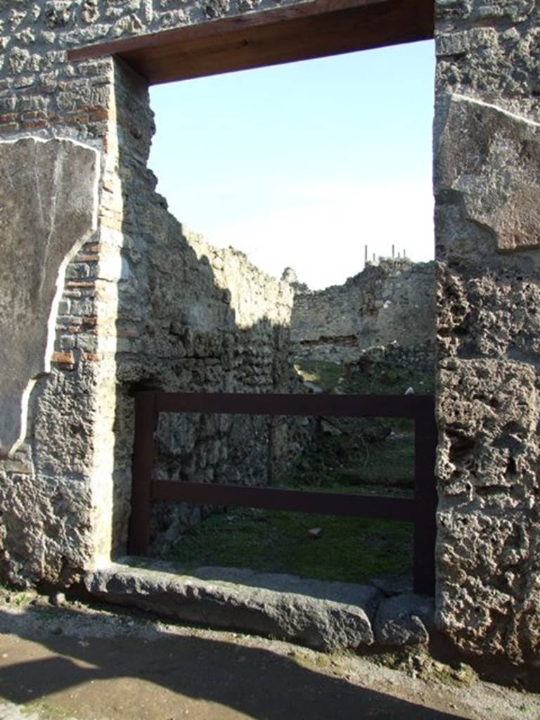 VII.11.2 Pompeii. December 2007. Entrance. According to Boyce, between the two entrances, on the pilaster on the left side above, Mercury was painted with an animal by his side. Helbig thought it resembled a dog more than a ram. Frohlich described it as vanished and destroyed.
See Boyce G. K., 1937. Corpus of the Lararia of Pompeii. Rome: MAAR 14. (p.111, no.20) 
See Helbig, W., 1868. Wandgemlde der vom Vesuv verschtteten Stdte Campaniens. Leipzig: Breitkopf und Hrtel. (12)
See Frhlich, T., 1991. Lararien und Fassadenbilder in den Vesuvstdten. Mainz: von Zabern. (F56)


