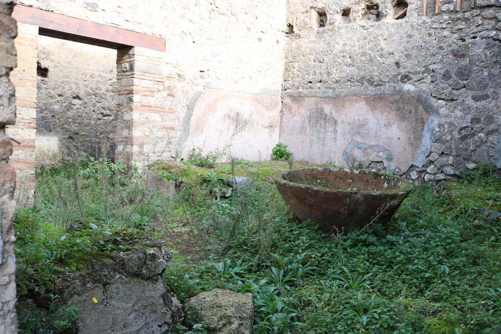 VII.11.5, Pompeii. December 2018. Looking towards doorway in north wall, on left, to corridor and latrine. Photo courtesy of Aude Durand.