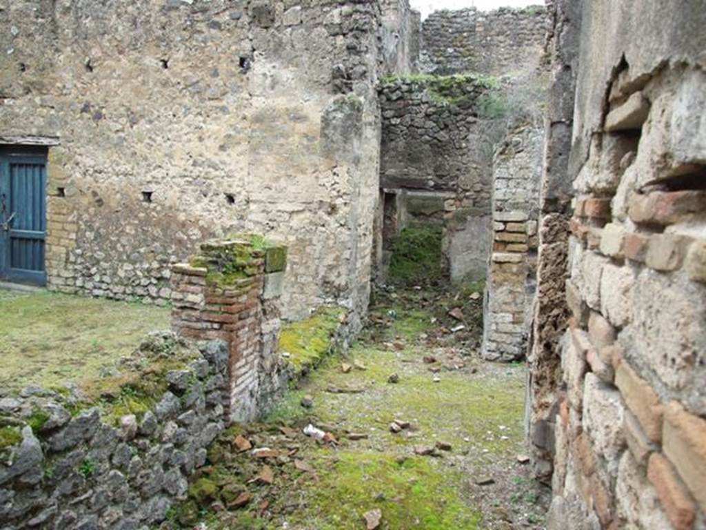 VII.11.14 Pompeii.  March 2009. Room 1. Passageway, looking towards West wall of Garden area A and Rooms 5 and 6.