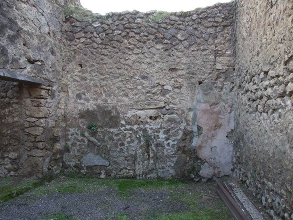 VII.11.15 Pompeii. December 2006. West wall of shop.