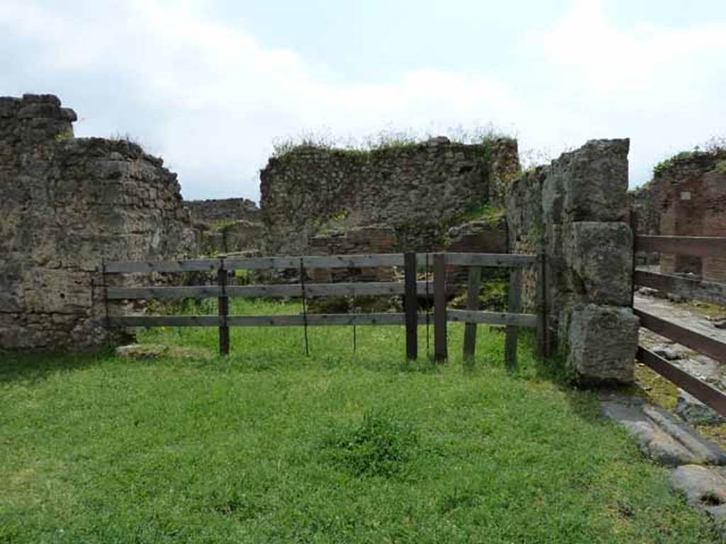 VII.12.1 Pompeii. May 2010. Looking south to room with oven and entrance VII.12.37, on the right.