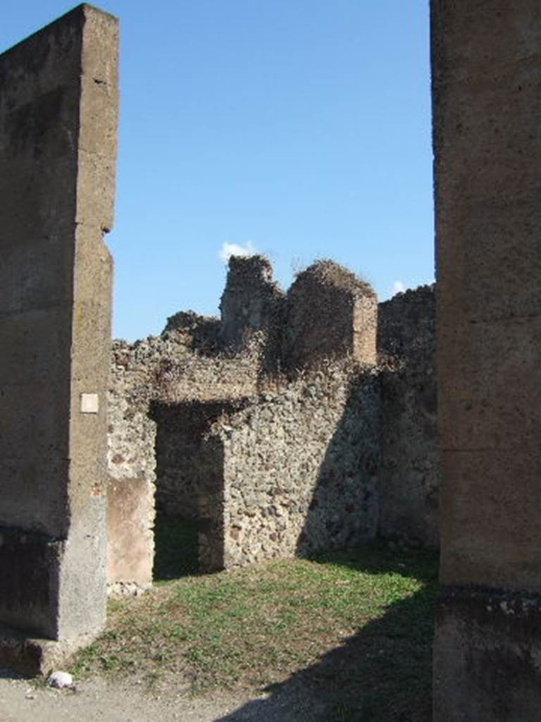 VII.12.8 Pompeii. September 2005. Entrance doorway and east wall.
