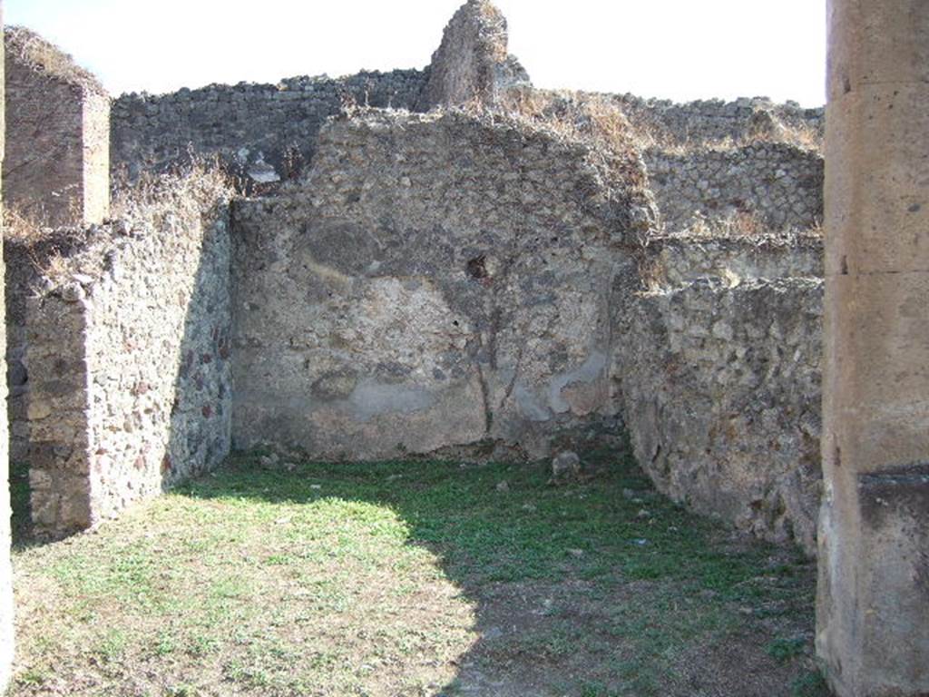 VII.12.8 Pompeii. September 2005. Looking south across shop.

