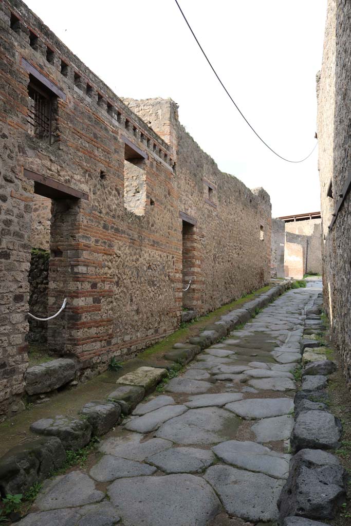  
VII.12.17 Pompeii, on left. December 2018. 
Looking north along west side of Vicolo del Lupanare. Photo courtesy of Aude Durand.

