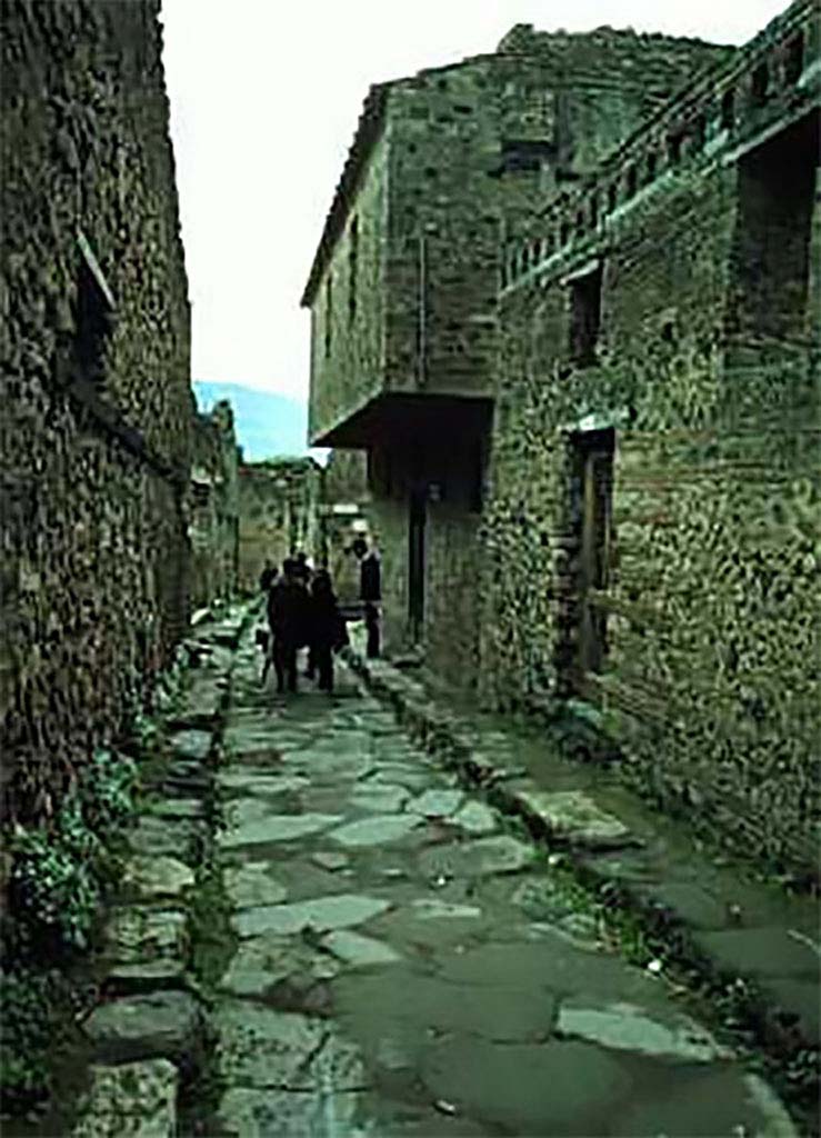 VII.12.18 and VII.12.17 Pompeii. 1988. 
Vicolo del Lupanare, looking south. Photo courtesy of Leo C. Curran.
