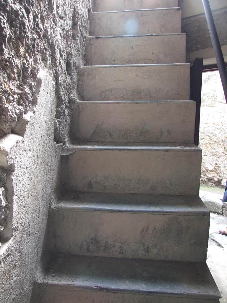 VII.12.20 Pompeii. March 2009. Staircase to upper floor (originally made of wood).