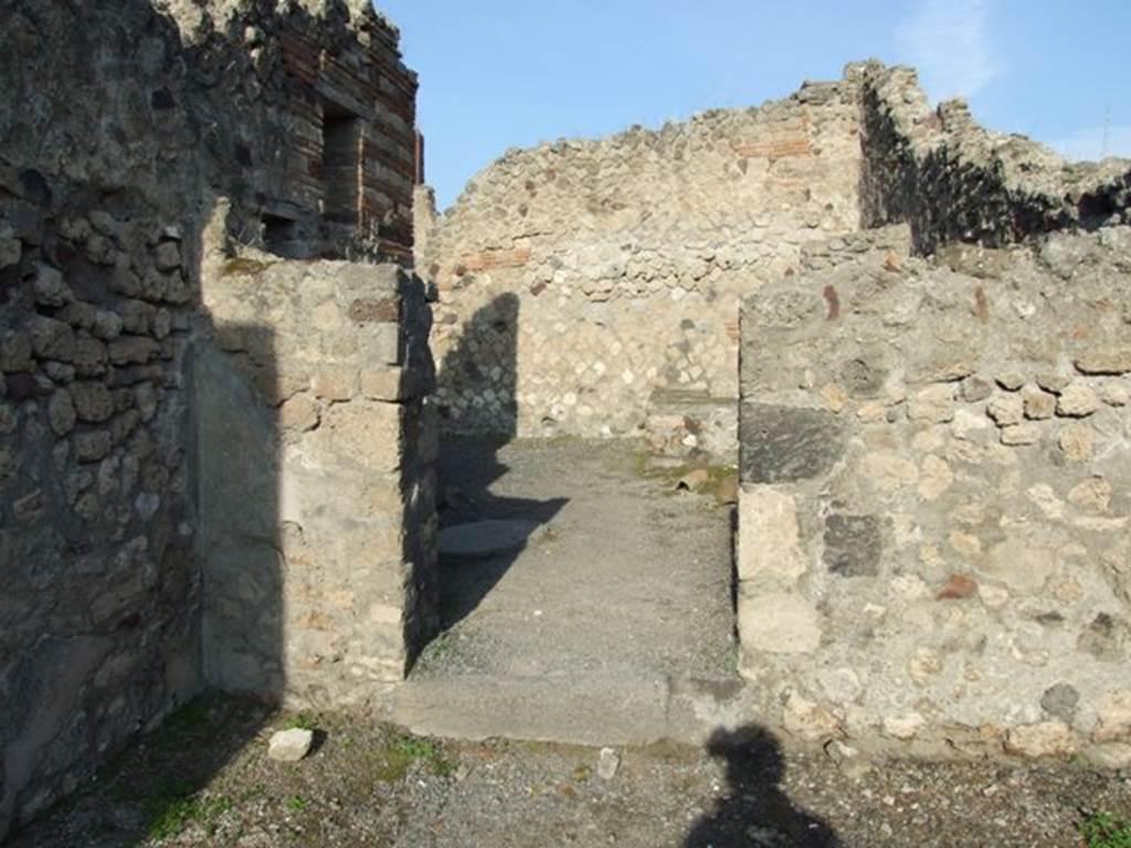 VII.13.7 Pompeii. December 2007. Doorway in north wall of shop, from shop to yard of dwelling.