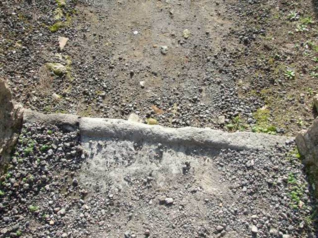 VII.13.7 Pompeii. December 2007. Entrance threshold or sill, from dwelling to shop.