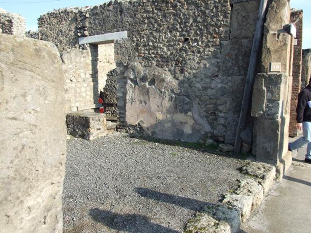 VII.13.10 Pompeii. December 2007. Looking east to entrance and east wall.