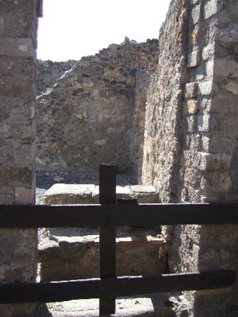 VII.13.11 Pompeii. September 2005. Looking west to steps to upper floor.